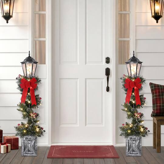 Puleo International 4ft. Pre-Lit Frosted Spiral Artificial Christmas Lamp Post with Decorative Pot Base, 2ct.